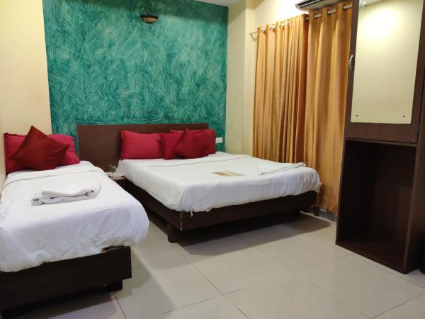 Hotel Golden Sagar : photo 3 de la chambre chambre triple deluxe