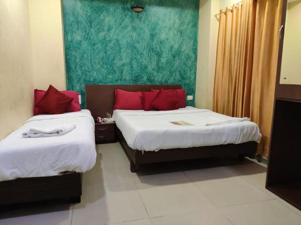 Hotel Golden Sagar : photo 1 de la chambre chambre triple deluxe