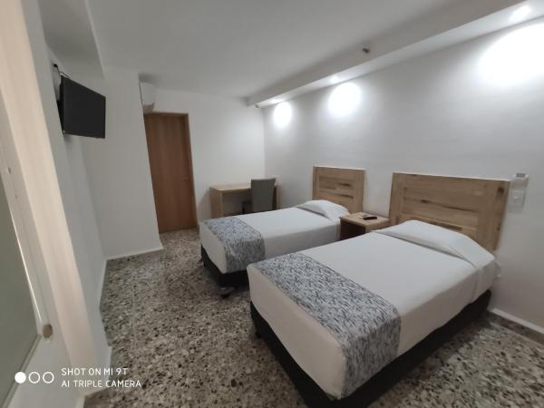 Booking 500 : photo 3 de la chambre chambre lits jumeaux