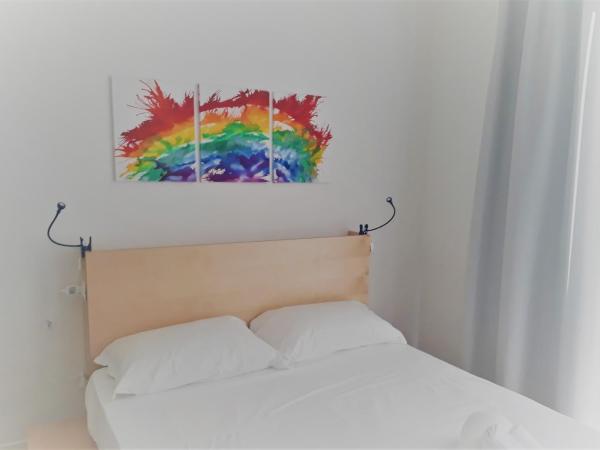 Luna Blu : photo 5 de la chambre chambre triple - vue sur jardin