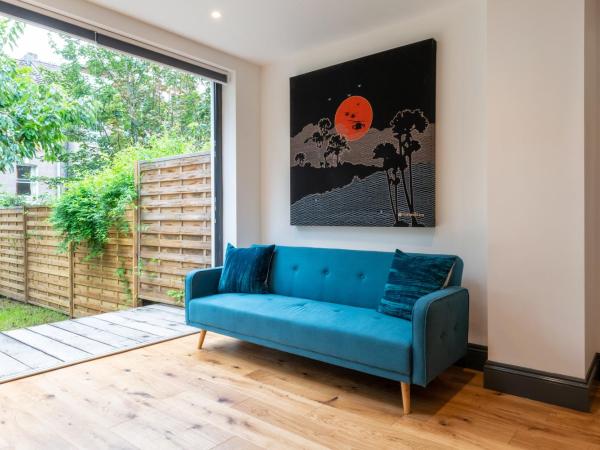 144 Lower Cheltenham Place : photo 1 de la chambre chambre lit king-size - vue sur jardin