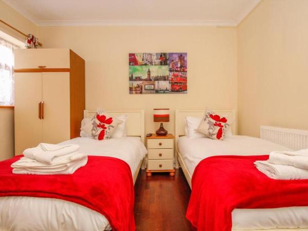 Harris Guest Accommodation : photo 1 de la chambre chambre lits jumeaux avec salle de bains