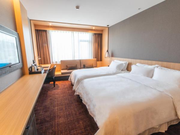 Hotel Coka Chuansha Metro - Shanghai PVG Airport : photo 1 de la chambre chambre familiale avec baignoire