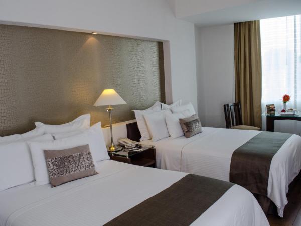 Mesón Ejecutivo Guadalajara Minerva - Av México : photo 5 de la chambre chambre supérieure avec 2 lits doubles