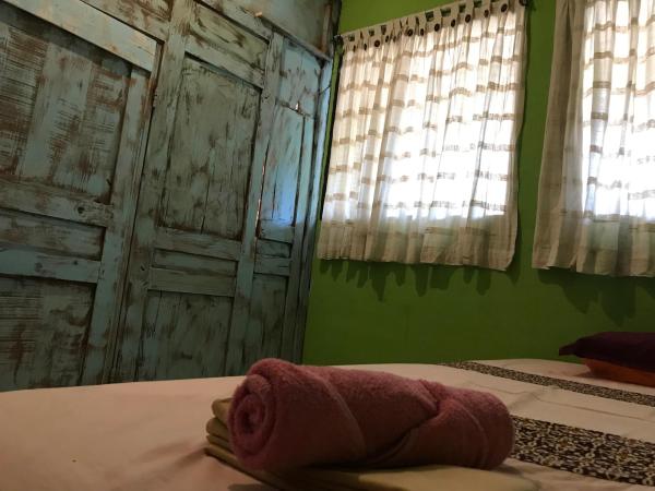 Arjuna Garden Homestay : photo 2 de la chambre chambre simple avec salle de bains commune