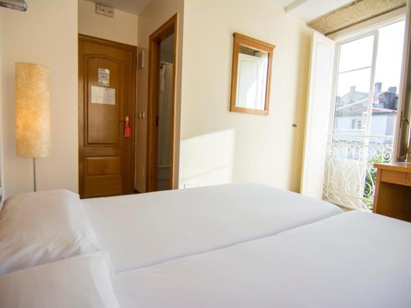 Libredón Rooms : photo 4 de la chambre chambre lits jumeaux supérieure - vue sur jardin