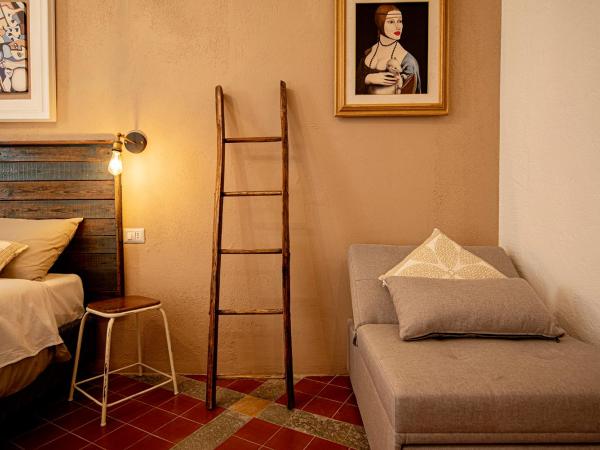 Balbis Choco Rooms : photo 3 de la chambre chambre triple deluxe