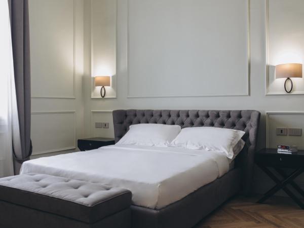 Gregorini Bingham Art Luxury Suites : photo 4 de la chambre suite supérieure lit king-size