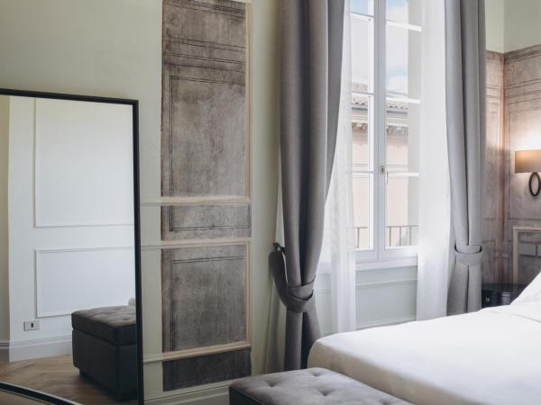 Gregorini Bingham Art Luxury Suites : photo 8 de la chambre suite deluxe avec lit king-size