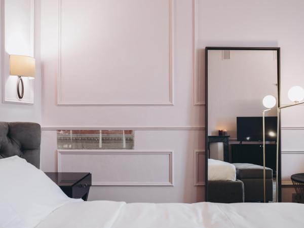 Gregorini Bingham Art Luxury Suites : photo 4 de la chambre suite supérieure lit king-size