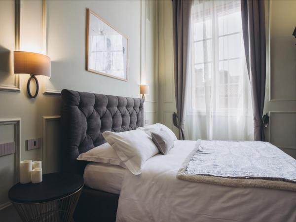 Gregorini Bingham Art Luxury Suites : photo 3 de la chambre suite supérieure lit king-size