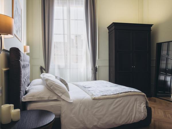 Gregorini Bingham Art Luxury Suites : photo 7 de la chambre suite supérieure lit king-size