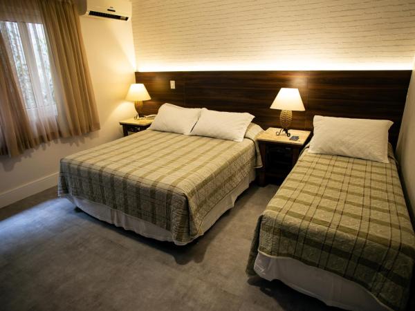 Pousada Aguas Claras : photo 1 de la chambre chambre triple classique