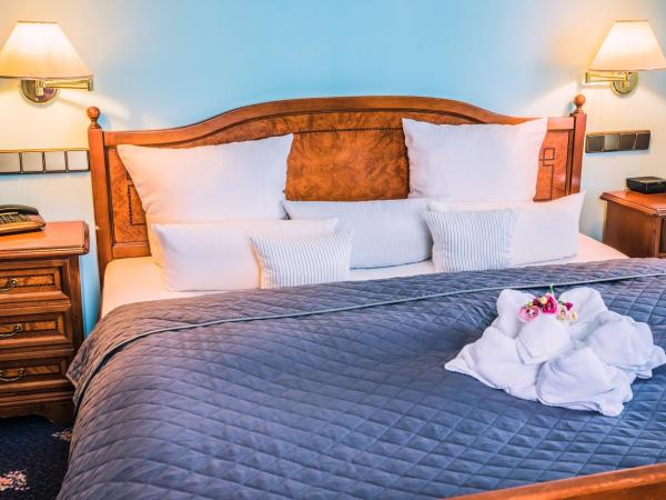 Hotel Rezydencja : photo 10 de la chambre chambre familiale (2 adultes + 1 enfant)