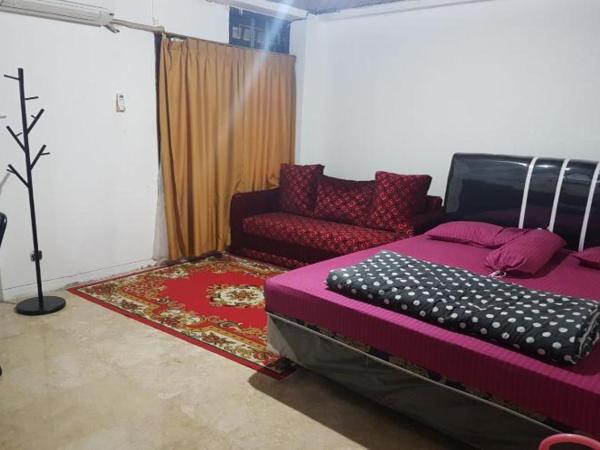 Mayestik Guest House Syariah : photo 6 de la chambre suite deluxe avec lit king-size