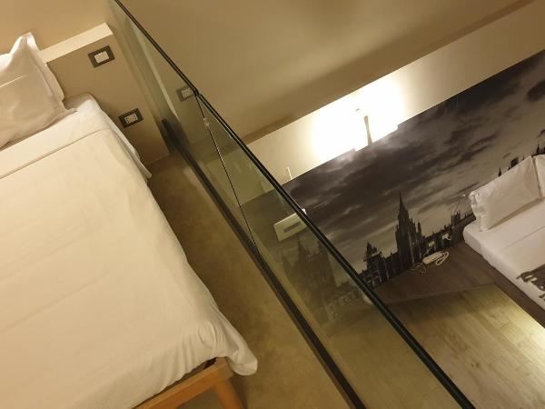 Hotel Seven Rooms : photo 4 de la chambre chambre quadruple en duplex