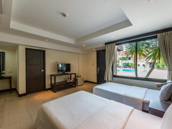 Hotel Tropicana Pattaya : photo 1 de la chambre chambre deluxe double ou lits jumeaux