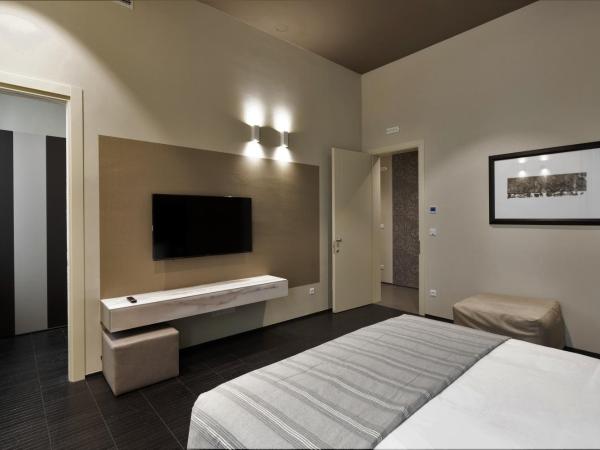 Salina Luxury Suites : photo 2 de la chambre chambre lit king-size