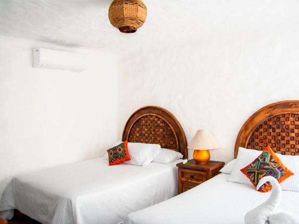 Petit Hotel Pilitas : photo 5 de la chambre suite quadruple