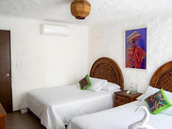 Petit Hotel Pilitas : photo 6 de la chambre suite quadruple