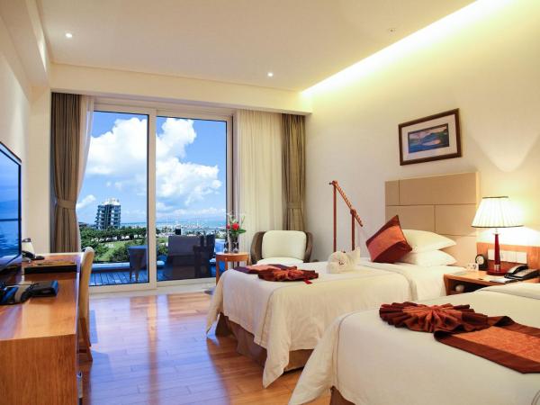 Mingshen Golf & Bay Resort Sanya : photo 5 de la chambre chambre double ou lits jumeaux deluxe - vue sur mer