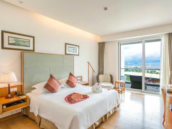 Mingshen Golf & Bay Resort Sanya : photo 2 de la chambre chambre double ou lits jumeaux deluxe - vue sur mer