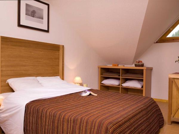 Madame Vacances Résidence Le Parc Des Airelles : photo 4 de la chambre appartement 2 ou 3 pièces avec espace de couchage supplémentaire (10 adultes) - bdt