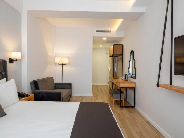 DORUK PALAS HOTEL : photo 4 de la chambre chambre triple deluxe - vue sur mer