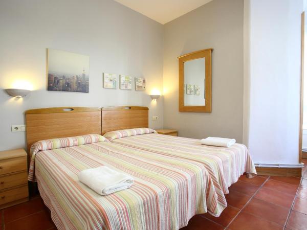 Pensión San Telmo / San Juan : photo 1 de la chambre chambre familiale standard avec salle de bains commune