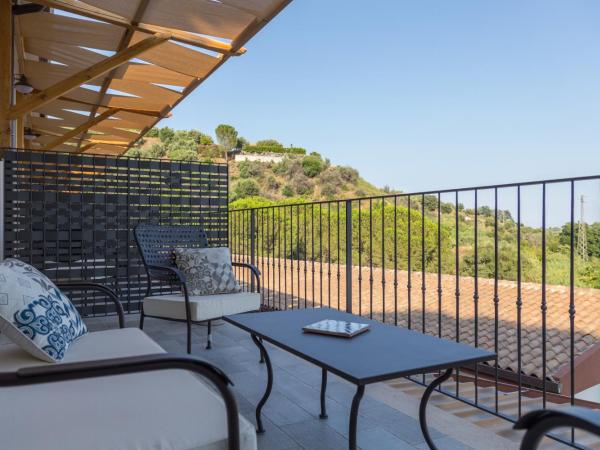 Don Vittorio Country Village : photo 3 de la chambre appartement avec balcon