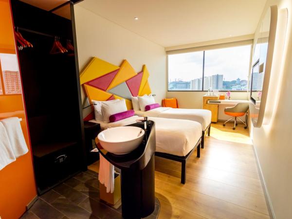 Ibis Styles Singapore On Macpherson : photo 1 de la chambre chambre lits jumeaux standard avec 2 lits simples