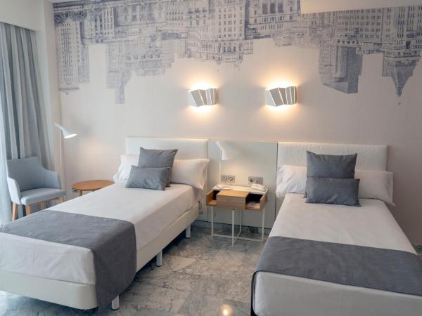 Hotel Madeira Centro : photo 1 de la chambre chambre lits jumeaux supérieure avec terrasse (2 adultes)