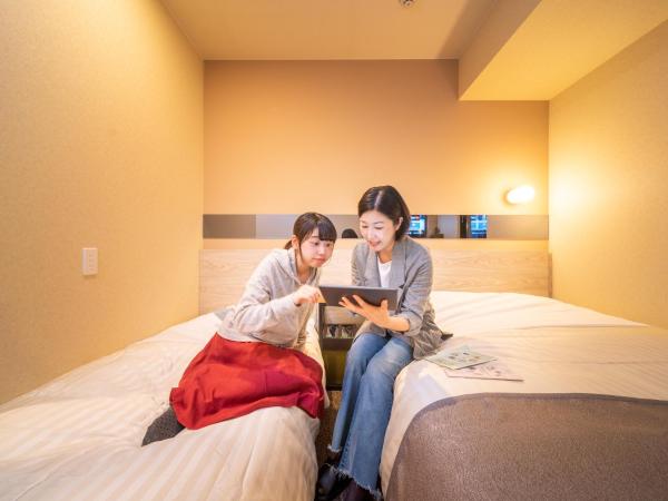 Super Hotel Premier Akihabara : photo 2 de la chambre petite chambre simple avec canapé-lit - non-fumeurs