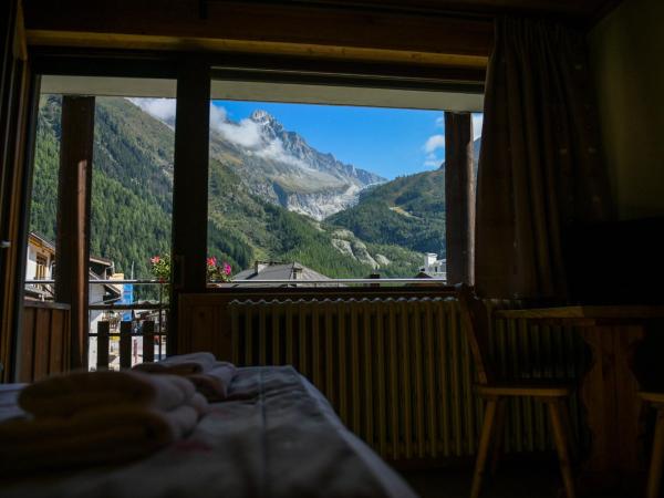 Le Dahu : photo 3 de la chambre chambre quadruple - vue sur montagnes