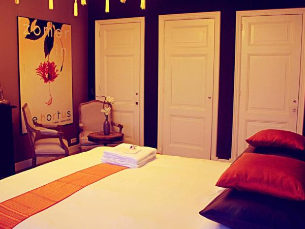 Maison Indochine : photo 7 de la chambre chambre double deluxe avec baignoire