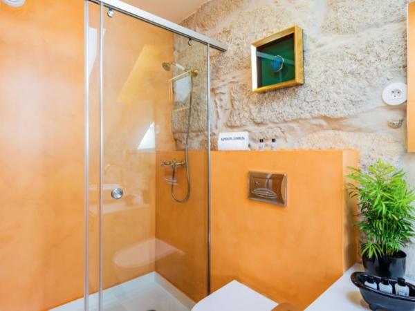 Maison Cabral : photo 8 de la chambre chambre double deluxe avec baignoire