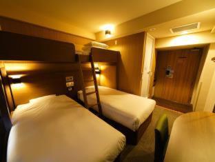 Super Hotel Lohas Ikebukuro-Eki Kitaguchi : photo 2 de la chambre chambre triple