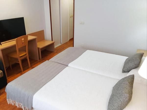 Hotel San Millán : photo 5 de la chambre chambre lits jumeaux