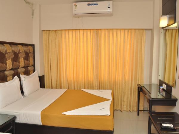 City Home : photo 1 de la chambre chambre deluxe double ou lits jumeaux