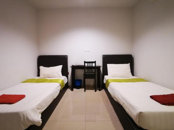 Clover Hotel Port Dickson : photo 7 de la chambre chambre lits jumeaux deluxe