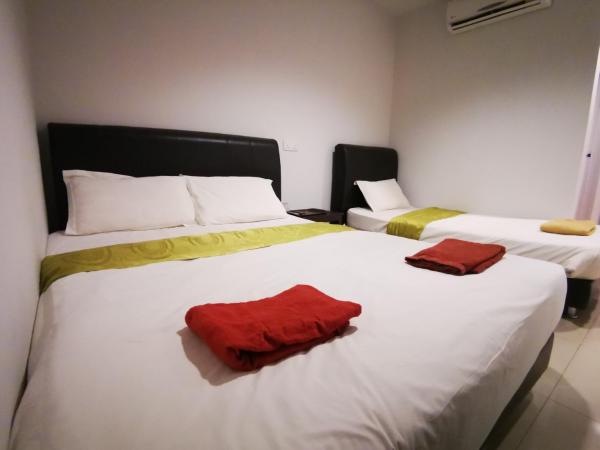 Clover Hotel Port Dickson : photo 2 de la chambre chambre triple deluxe