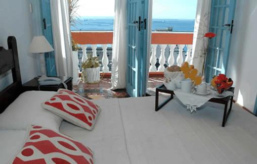 Bed & breakfast Villa Carmo : photo 2 de la chambre chambre quadruple - vue sur mer