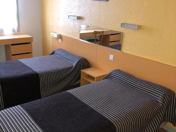 Hôtel Au Petit Languedoc : photo 2 de la chambre chambre lits jumeaux