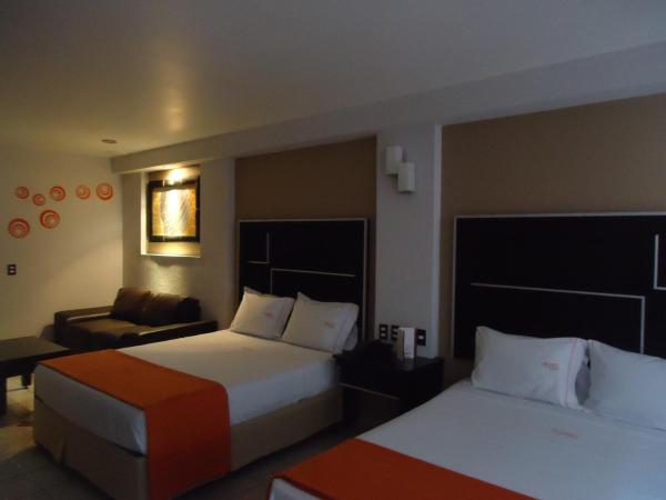 Hotel Estadio : photo 10 de la chambre chambre de luxe avec 2 lits queen-size.