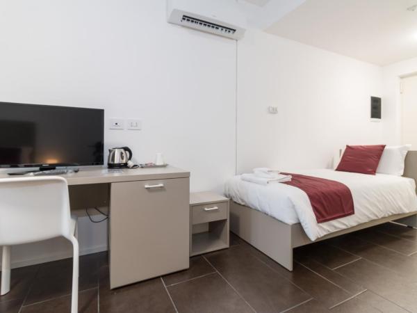 Hotel Cascina Fossata & Residence : photo 5 de la chambre chambre triple confort