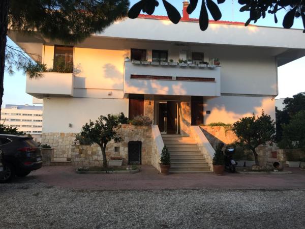 La Casa di Emanuella - Rooms & International Suites : photo 2 de la chambre chambre lit king-size