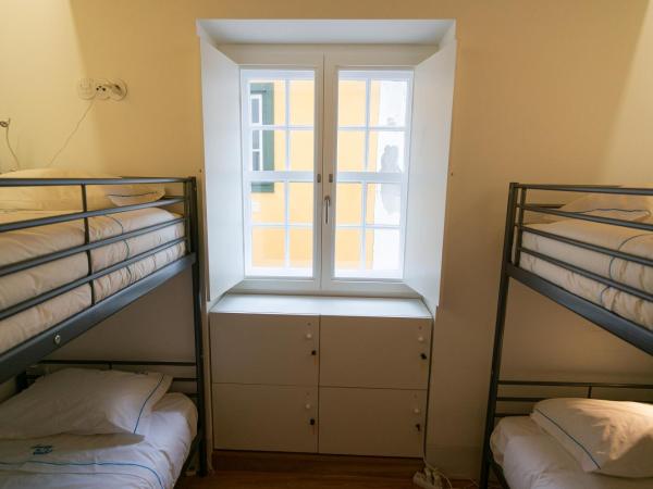 Change The World Hostels - Coimbra - Almedina : photo 2 de la chambre lit dans dortoir mixte de 4 lits