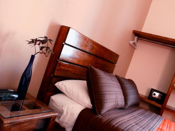 Hostel Hospedarte Centro : photo 8 de la chambre chambre quadruple avec salle de bains commune