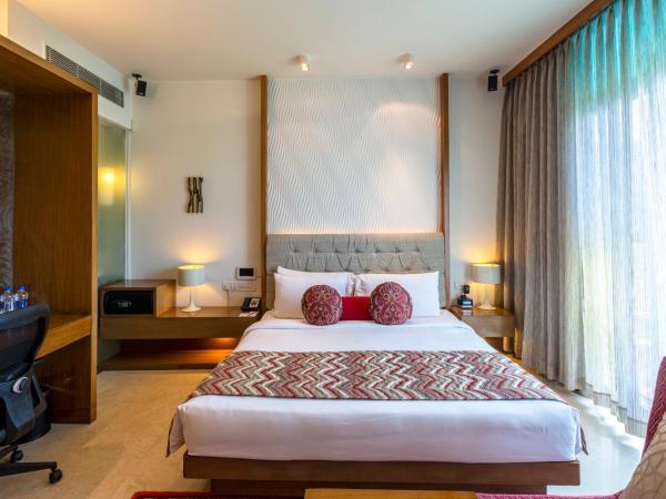 Vivanta Bengaluru, Whitefield : photo 1 de la chambre deluxe room garden view queen bed