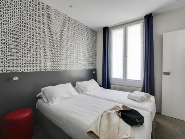 Parici Hôtel Boulogne Billancourt : photo 1 de la chambre chambre lits jumeaux
